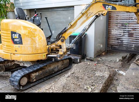 digging driveway mini excavator|digging basement with mini excavator.